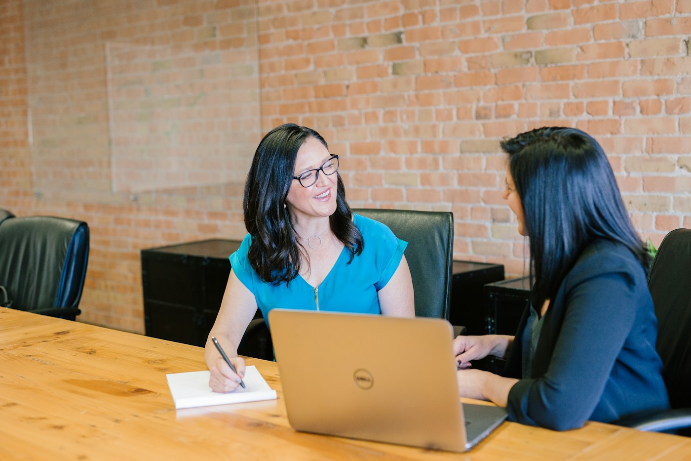 Professionals collaborating in a bright meeting space